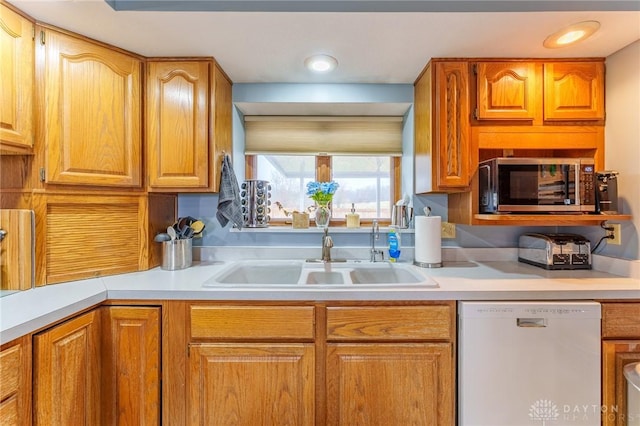 kitchen with sink and white dishwasher