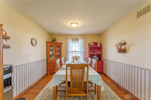 dining room featuring light wood-type flooring