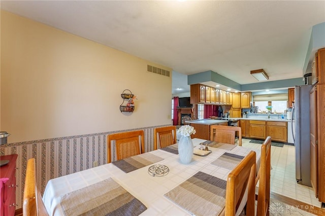 dining area featuring sink