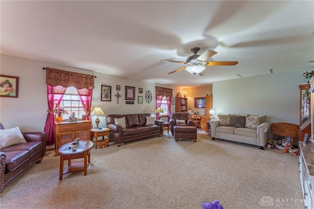 carpeted living room with ceiling fan