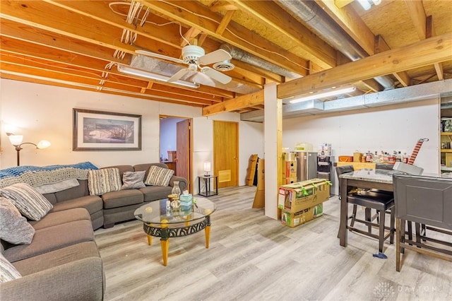 interior space featuring wood-type flooring and ceiling fan