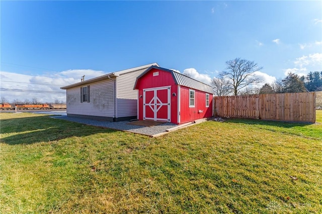 view of outdoor structure with a yard