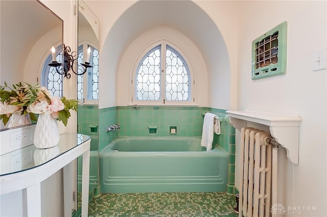 1515 Woodstock Dr, Oakwood, OH 45419 - full bath with radiator, a bath, tile walls, and wainscoting