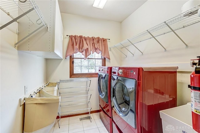 laundry room with washer and dryer