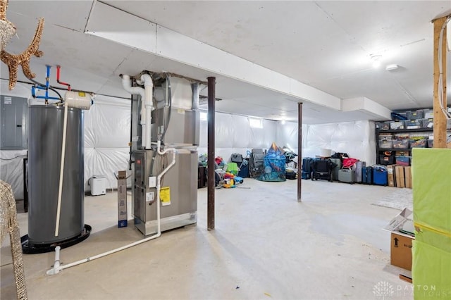 basement featuring heating unit, electric panel, and water heater