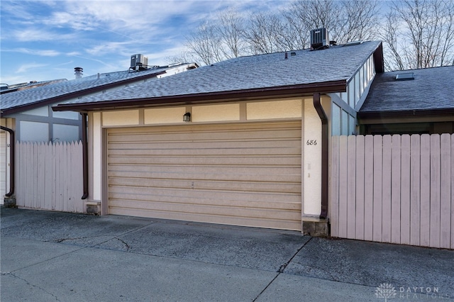 garage featuring central AC unit