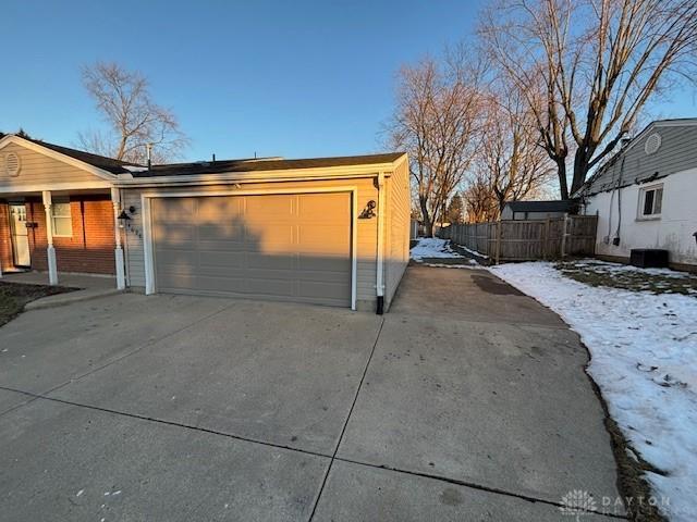 view of snow covered garage