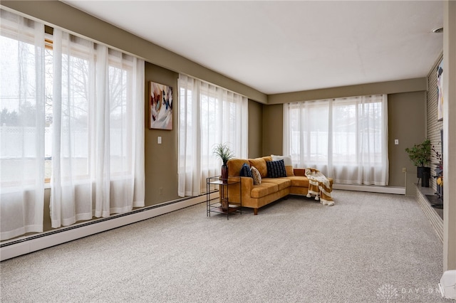 interior space featuring a baseboard radiator and carpet flooring