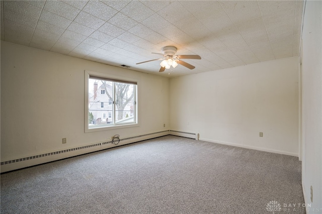 empty room with ceiling fan, carpet flooring, and baseboard heating