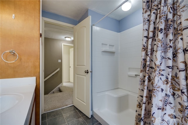 bathroom with vanity, tile patterned floors, and a shower with curtain