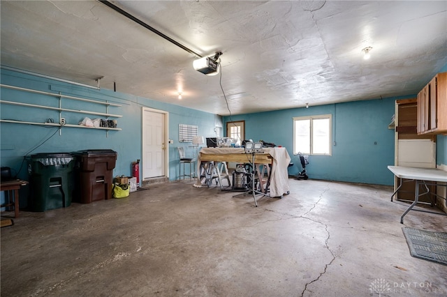 garage featuring a garage door opener