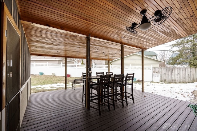 snow covered deck featuring ceiling fan