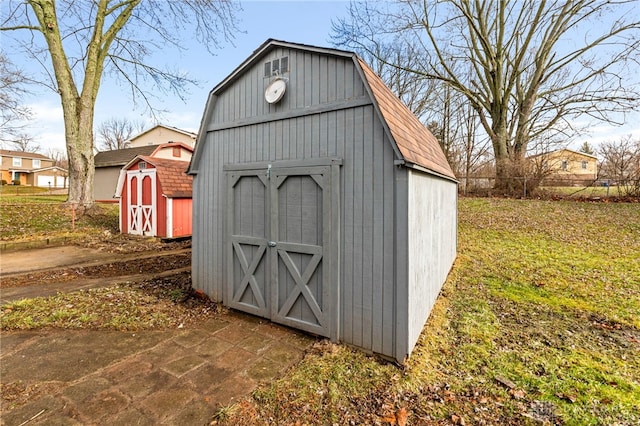 view of outdoor structure with a yard