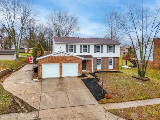 view of front property with a garage and a front lawn