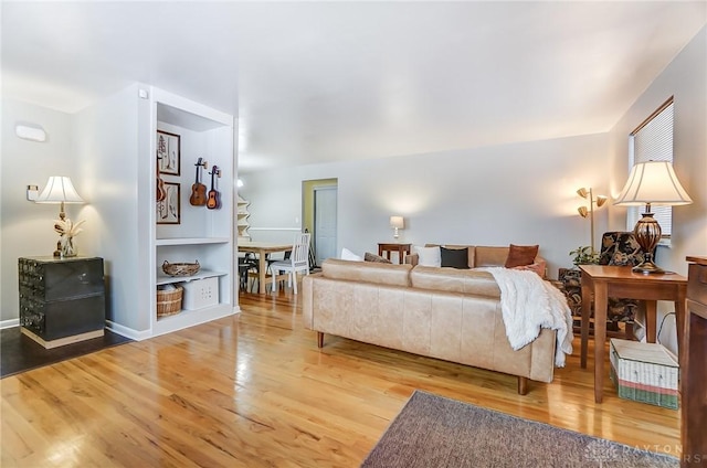 living room with hardwood / wood-style flooring