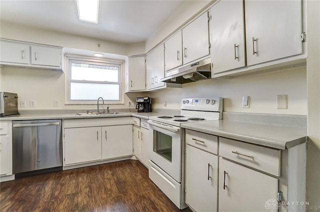 kitchen featuring electric stove, stainless steel dishwasher, white cabinetry, and sink