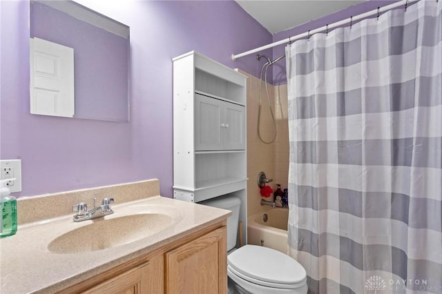 full bathroom with shower / bath combination with curtain, vanity, and toilet