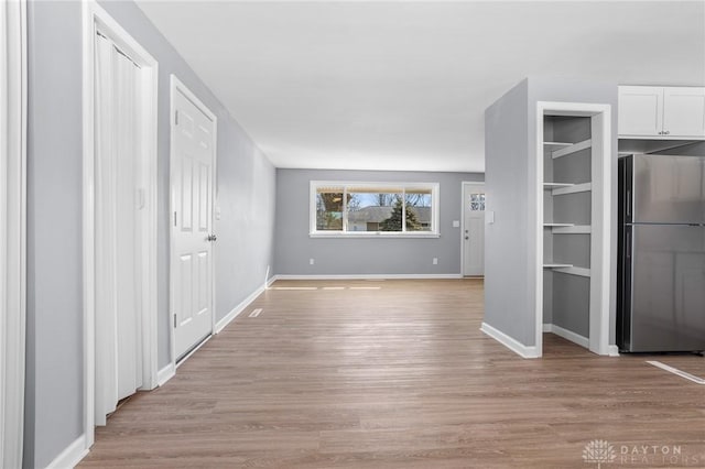 interior space with light hardwood / wood-style floors