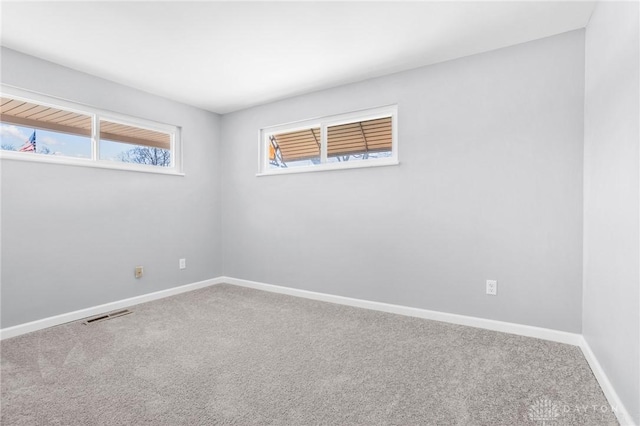 view of carpeted spare room