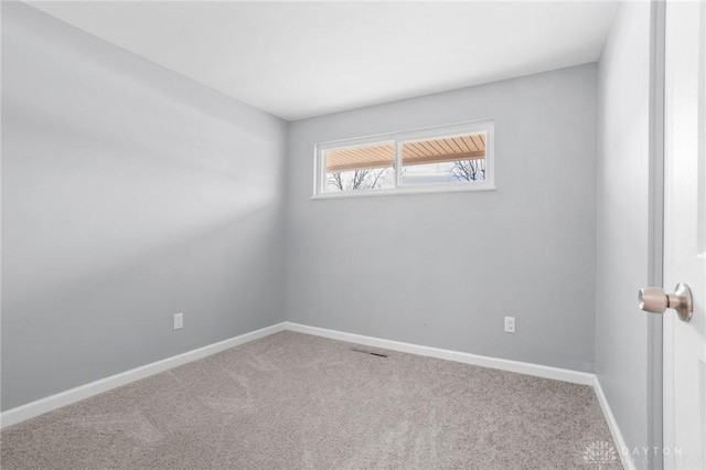 view of carpeted spare room