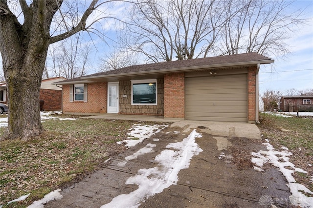 single story home with a garage