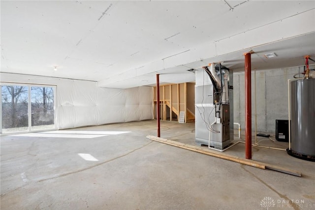 basement with heating unit and water heater