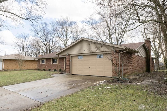 single story home with a garage and a front lawn