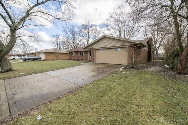 ranch-style home with a garage and a front lawn