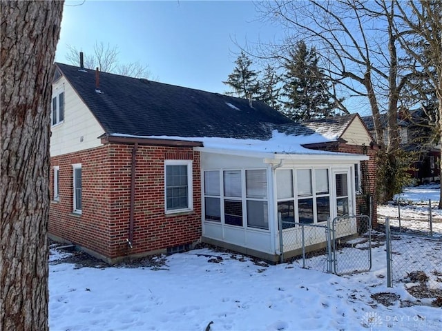 view of snow covered property