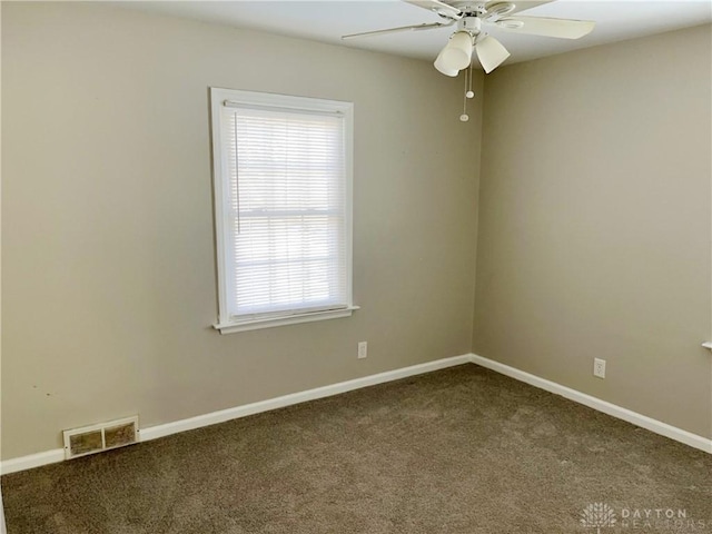 carpeted empty room with ceiling fan