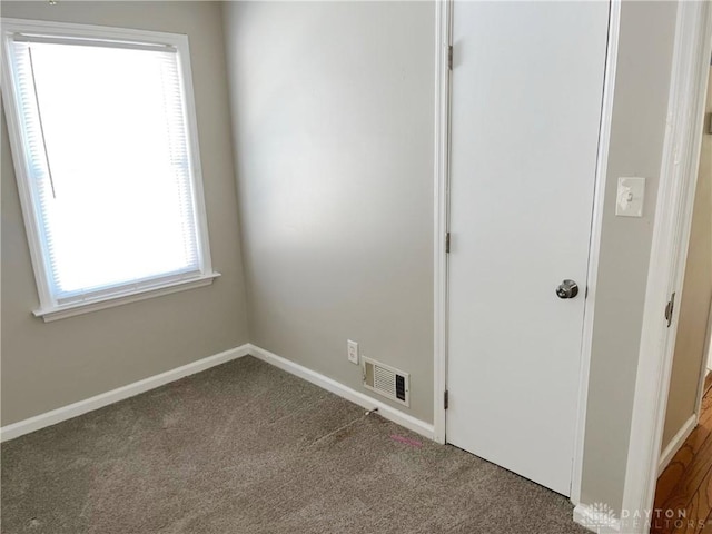 empty room featuring carpet