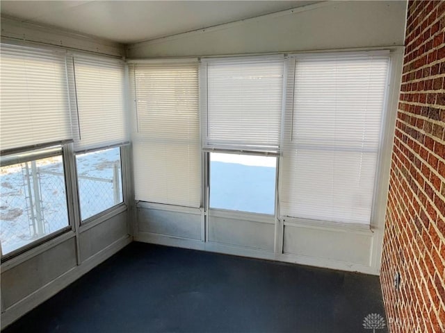 unfurnished sunroom with a healthy amount of sunlight