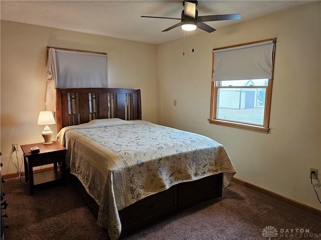 carpeted bedroom with ceiling fan