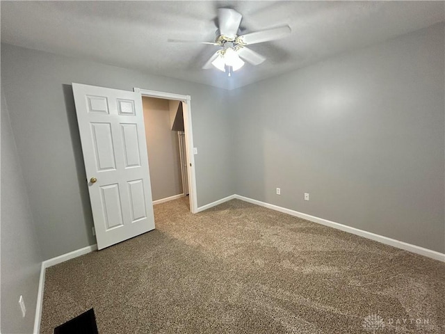 unfurnished bedroom with carpet and ceiling fan