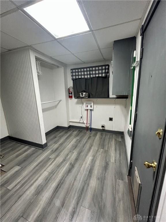 washroom featuring wood-type flooring and washer hookup