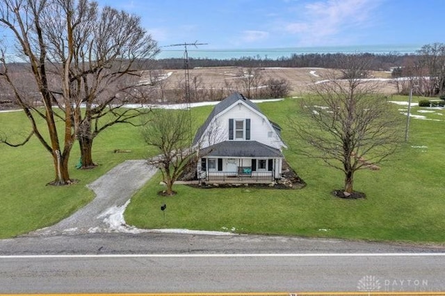 exterior space featuring a front yard and covered porch