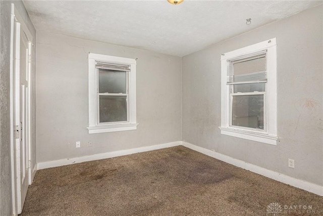 view of carpeted spare room