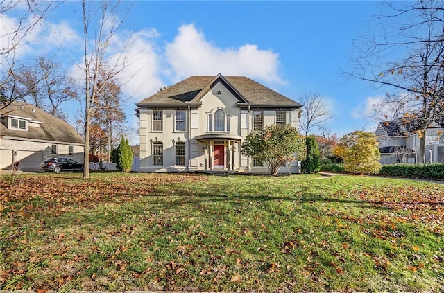 view of front of property with a front lawn