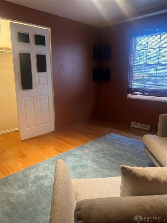 living area with wood finished floors