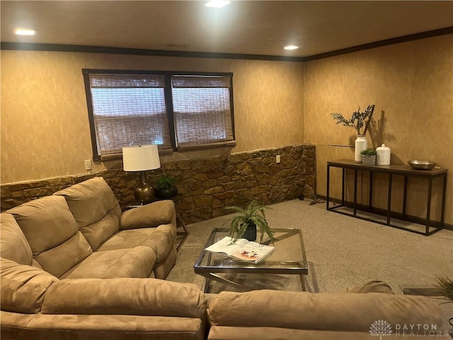 living room featuring ornamental molding and carpet floors