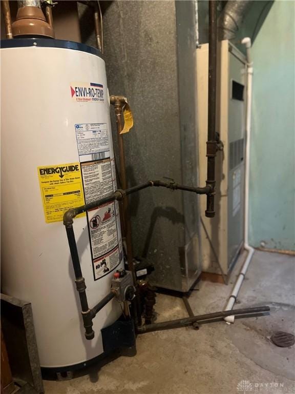 utility room featuring gas water heater