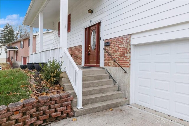 property entrance with a garage