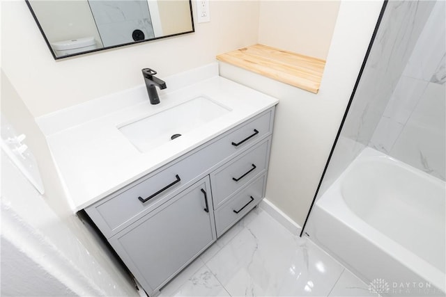 bathroom with vanity and toilet