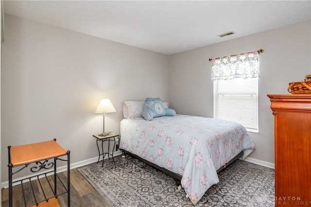 bedroom featuring hardwood / wood-style flooring