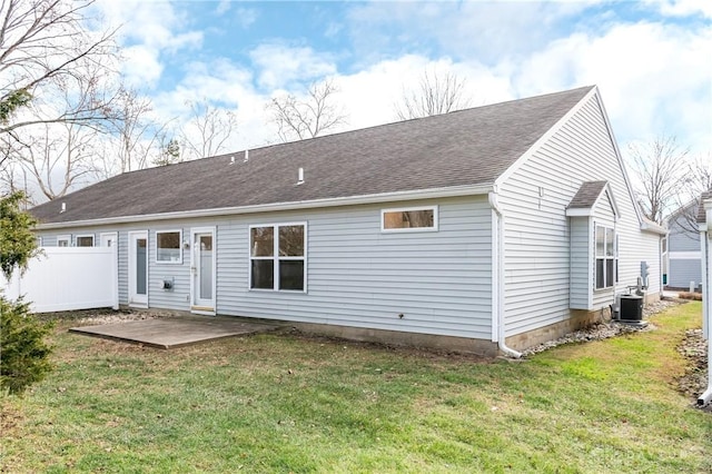 back of house with a patio, a yard, and central AC unit