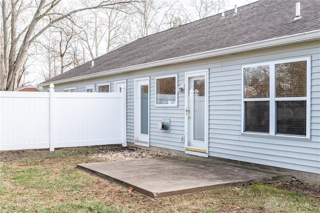 entrance to property with a patio