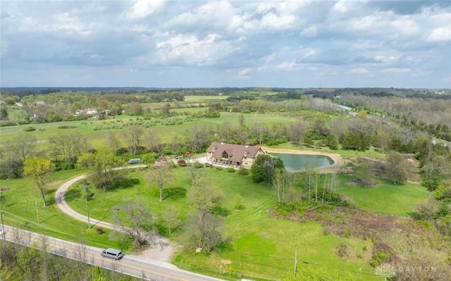 aerial view featuring a water view and a rural view