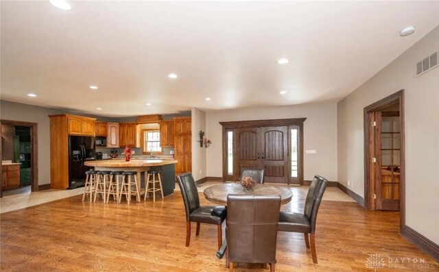 dining area featuring light hardwood / wood-style flooring