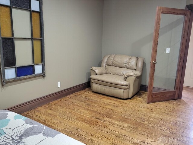 living area featuring light hardwood / wood-style floors