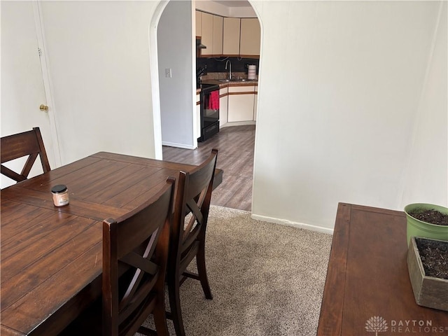 view of carpeted dining area